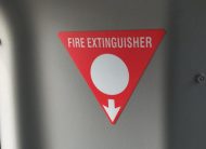 Fire extinguisher sign | Featured image of the Coaster Bus Conversion page for Bus 4x4 Group