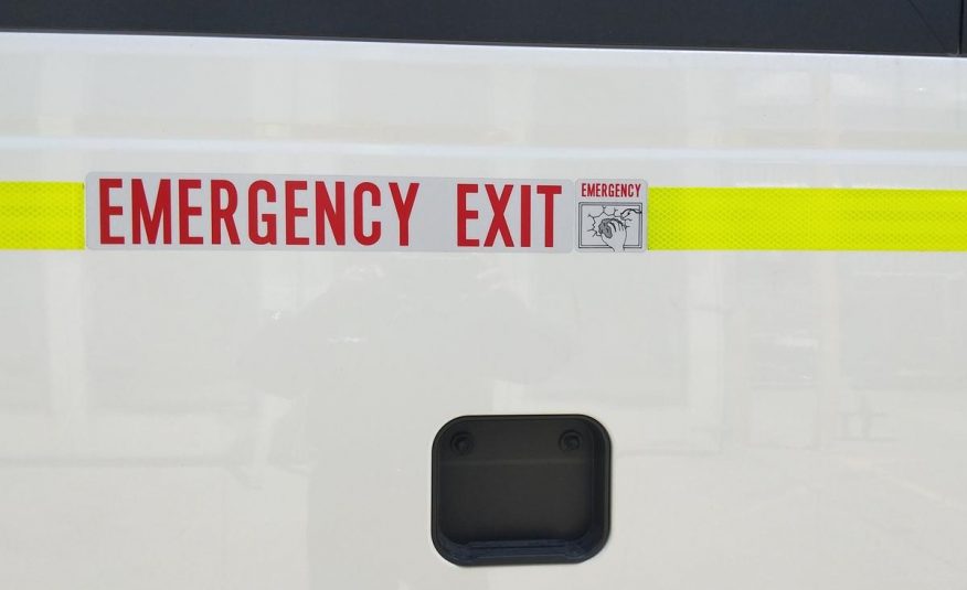 Emergency Exit Sign on Coaster | Featured image of the Coaster Bus Conversion page for Bus 4x4 Group